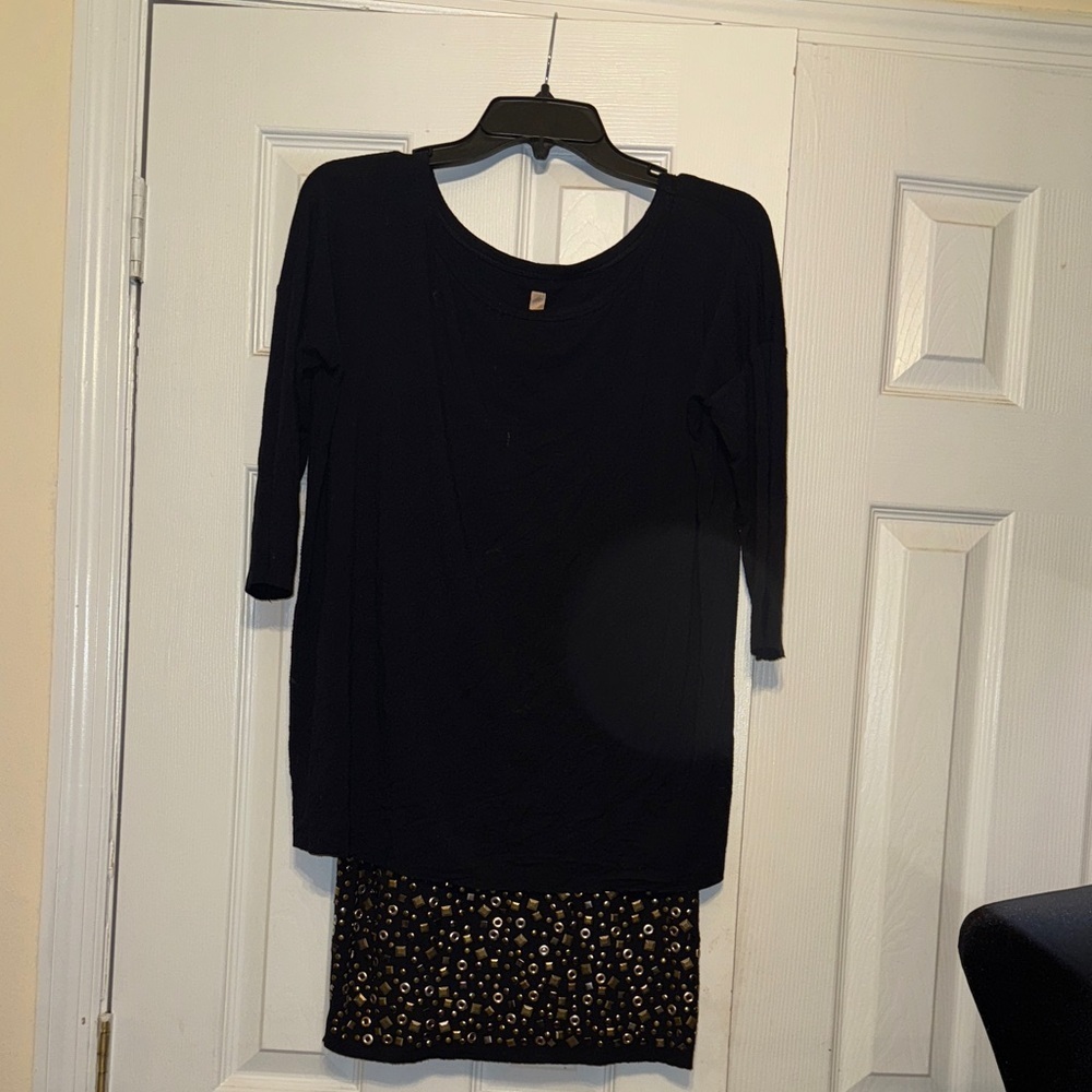 Elegant Black Blouse with Gold Accents